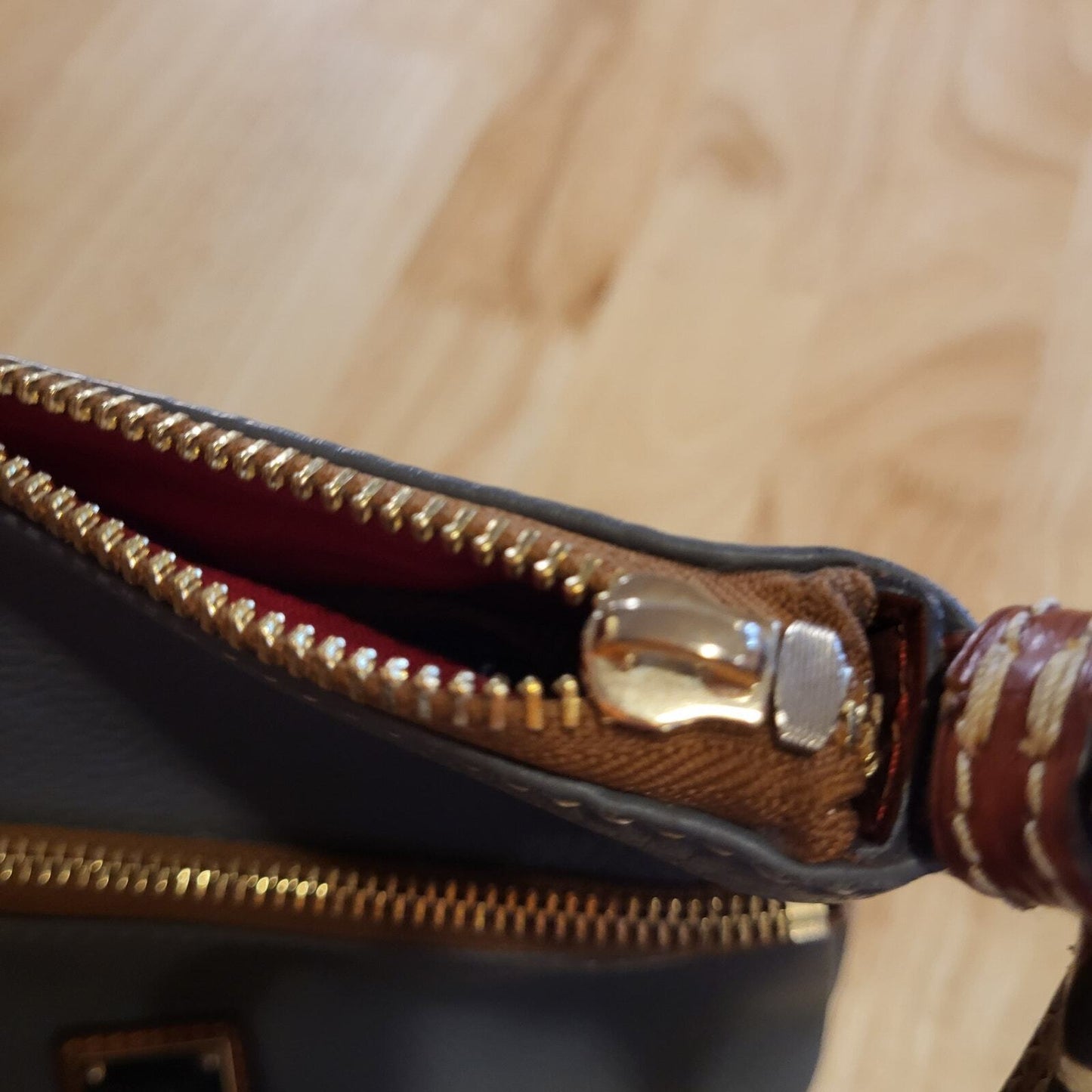 Dooney & Bourke Pebble Grain Letter Carrier Bag Dark Gray Red Lining Gold