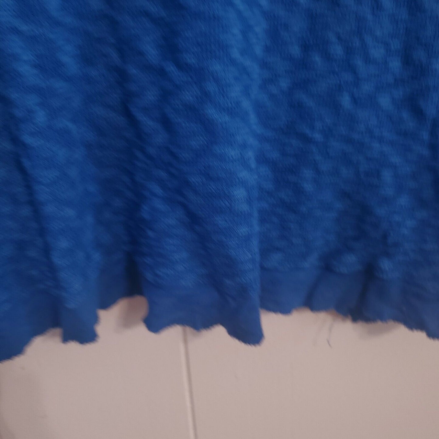 Anthropologie Left of Center Womens top XS Ruffle hem long sleeve Blue(see Hole)