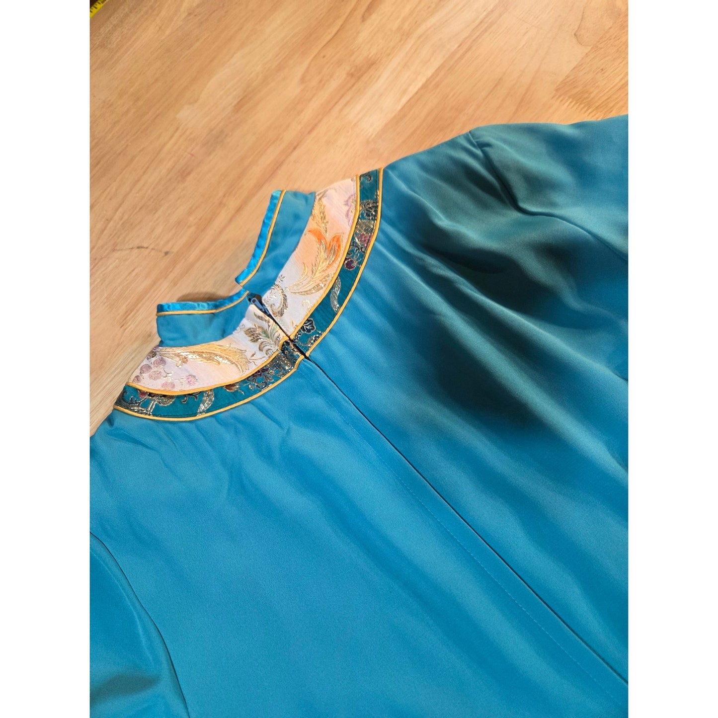 Turquoise blue Chinese traditional dress cap sleeve ornamental trim detail small