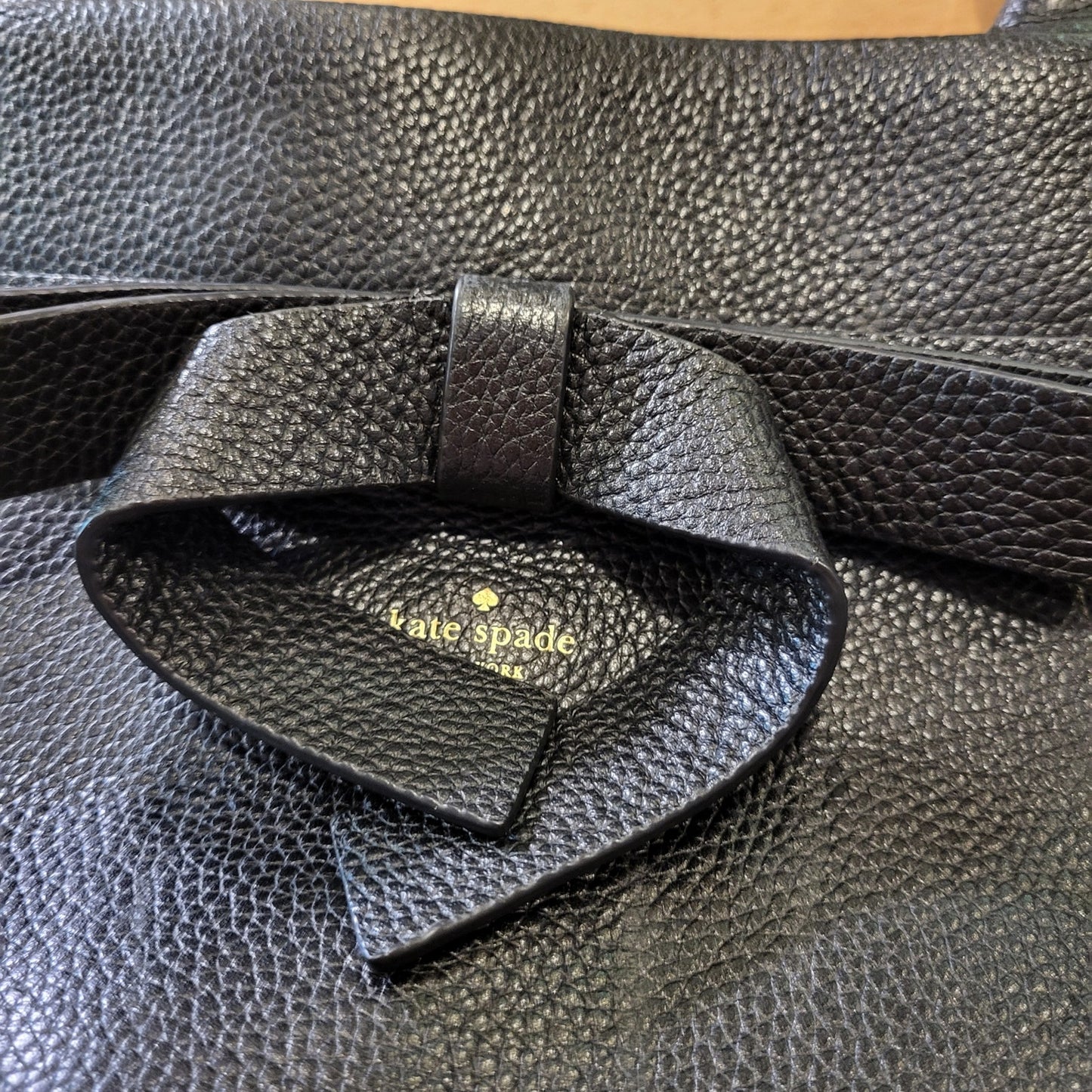 Kate Spade black pebbled leather top handle bag large bow zip closure