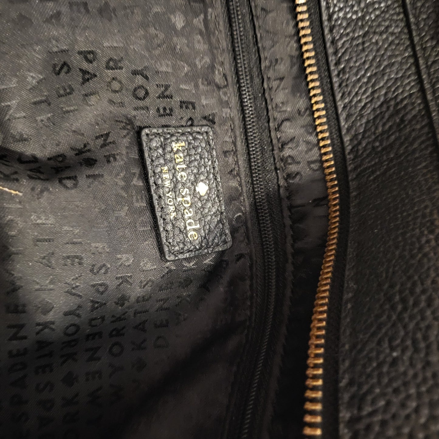 Kate Spade black pebbled leather top handle bag large bow zip closure
