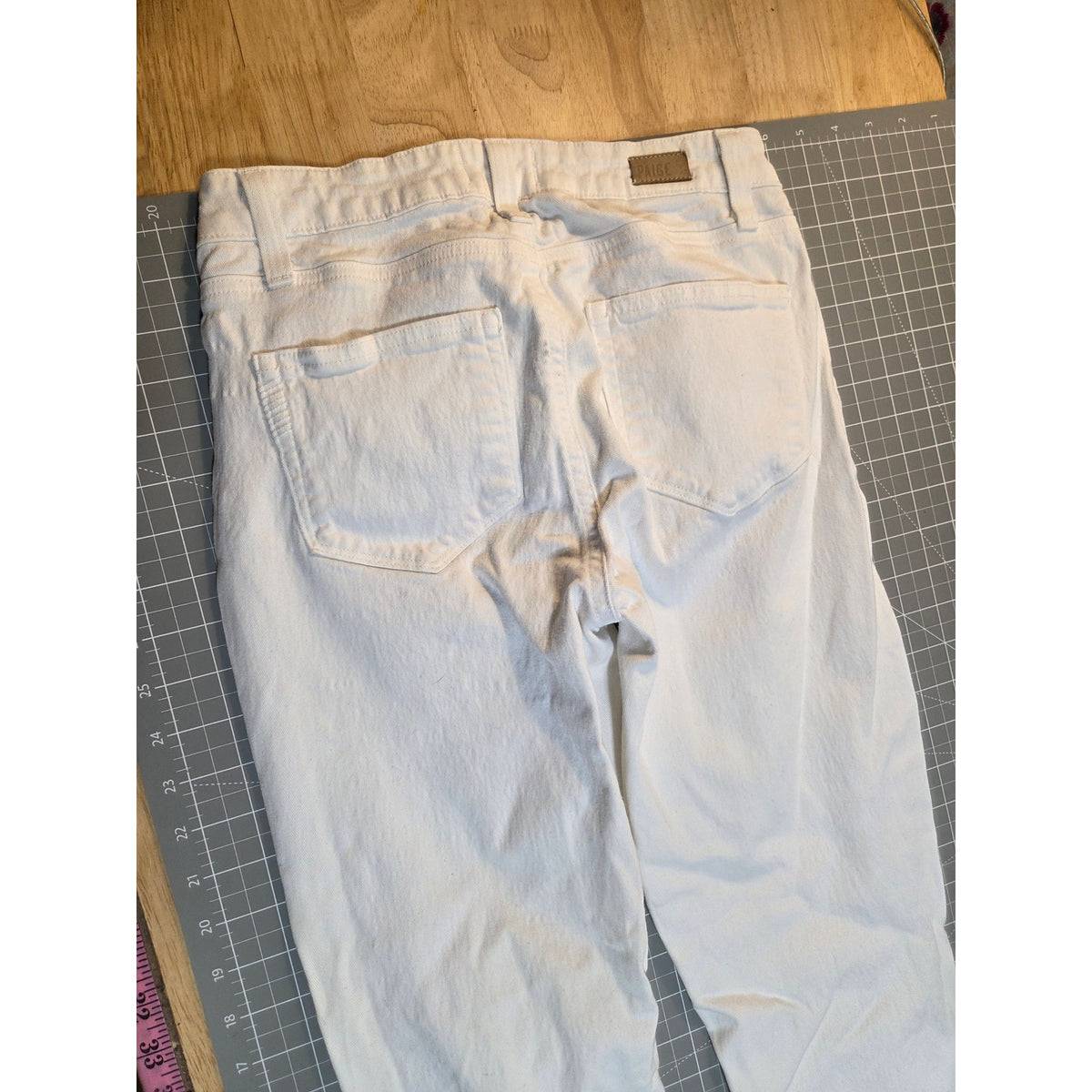 Paige white denim skinny jeans size 24