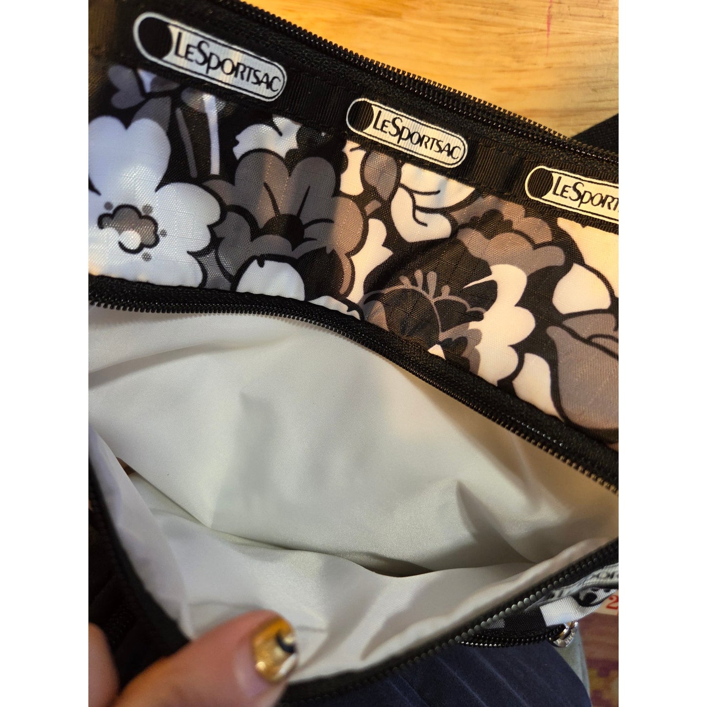Lesportsac Never been used small black white floral shoulder strap 3 pocket