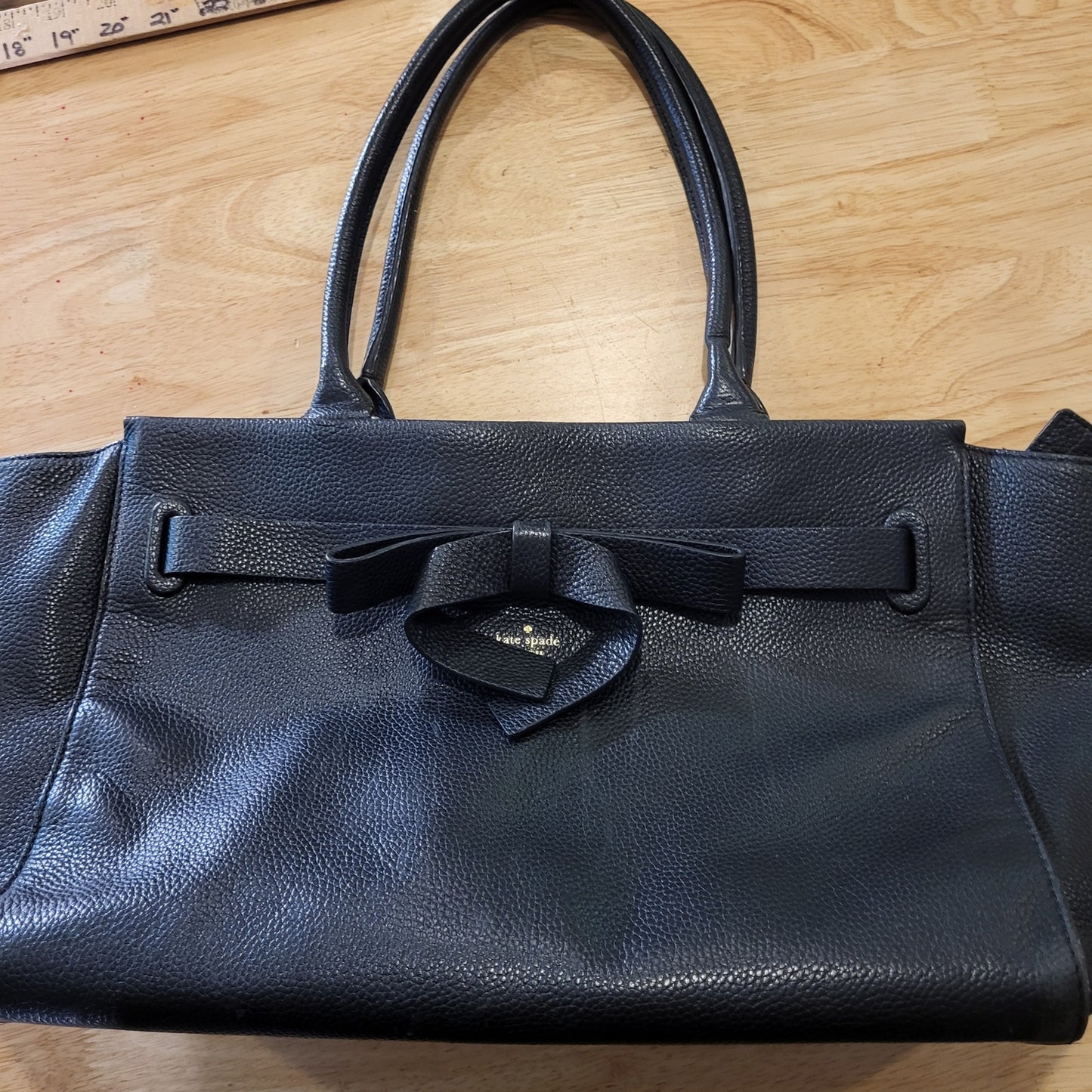 Kate Spade black pebbled leather top handle bag large bow zip closure
