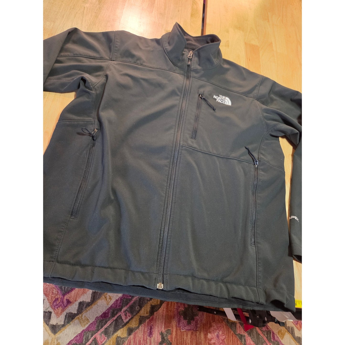 Black North Face jackets missing straps on sleeves but good condition LRG