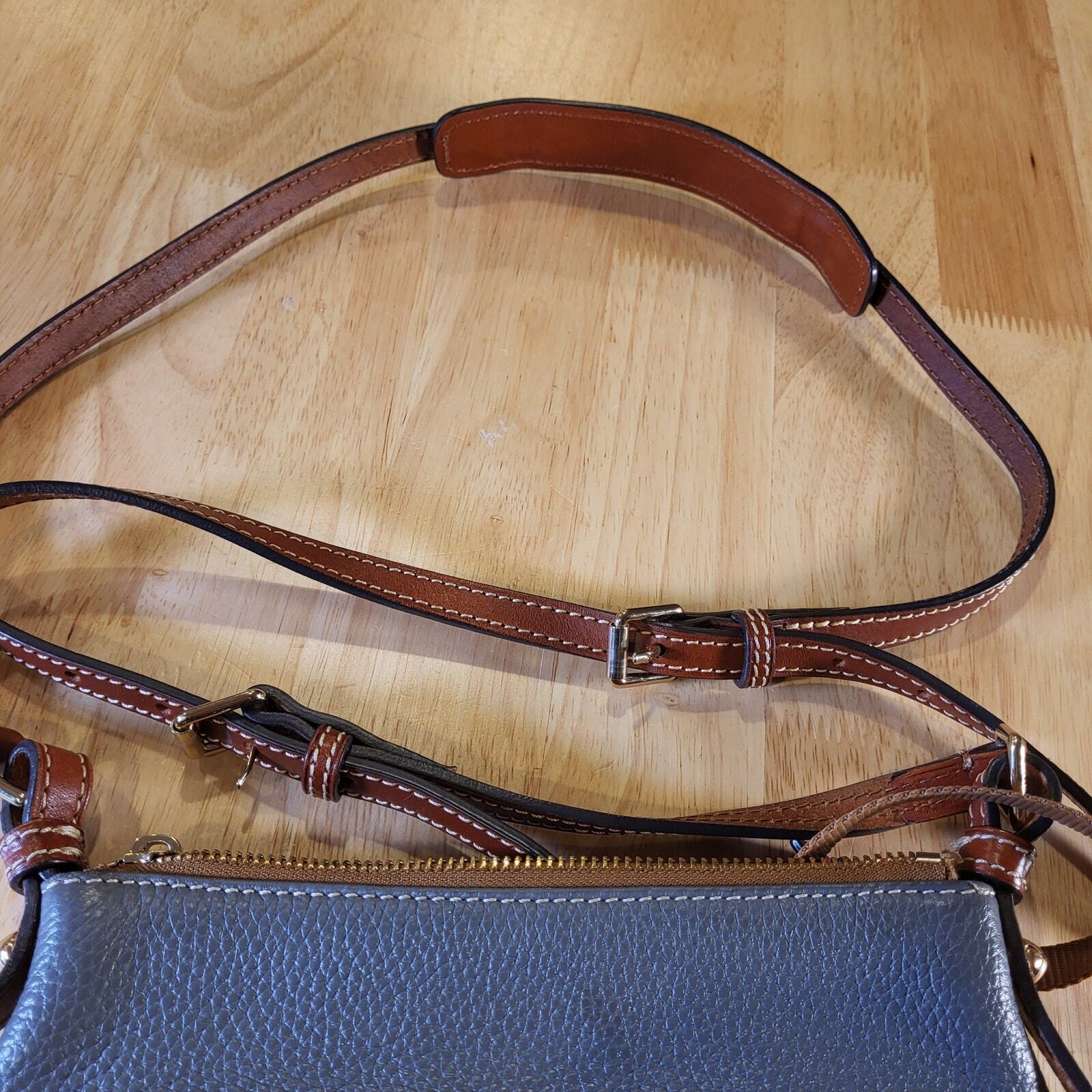 Dooney & Bourke Pebble Grain Letter Carrier Bag Dark Gray Red Lining Gold