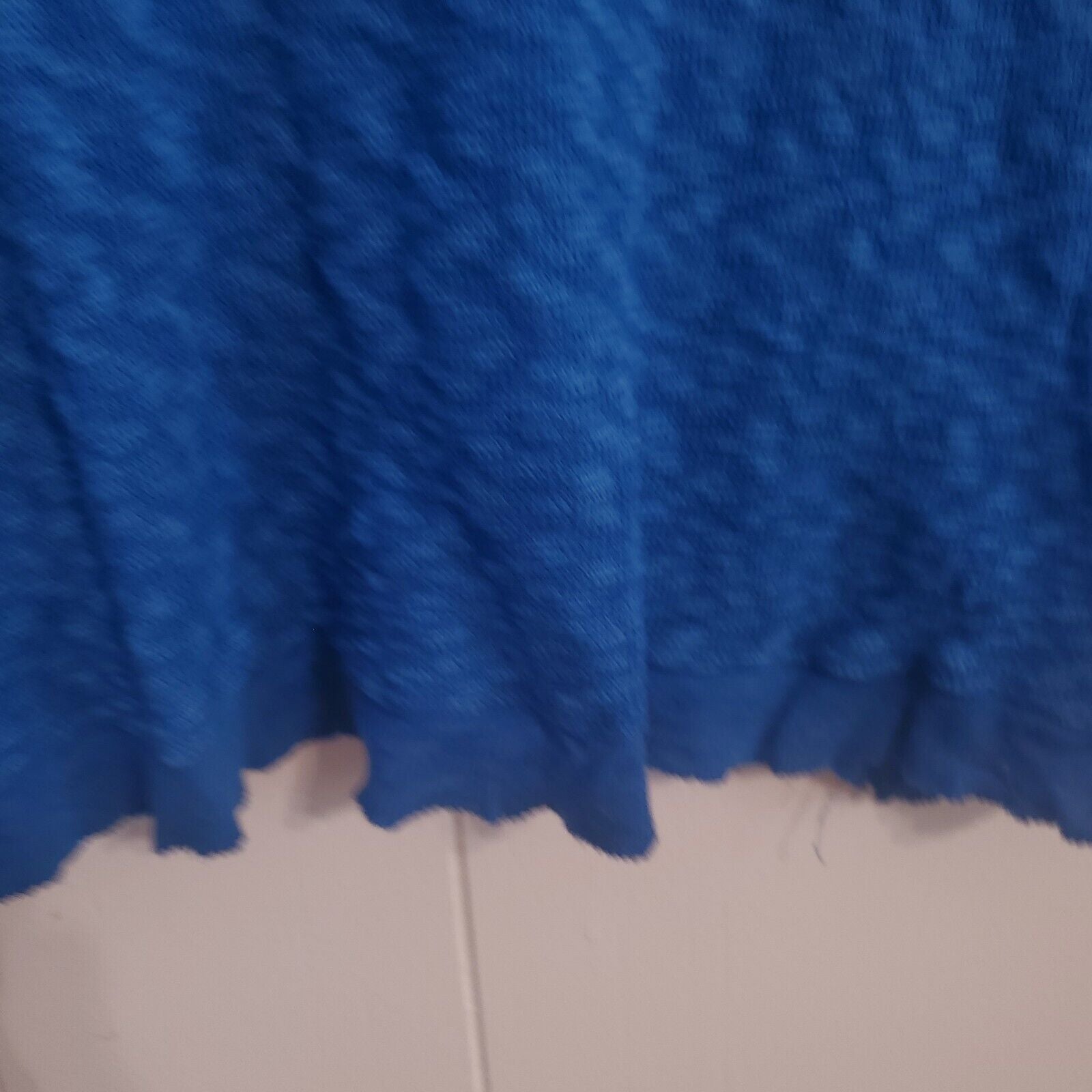 Anthropologie Left of Center Womens top XS Ruffle hem long sleeve Blue(see Hole)