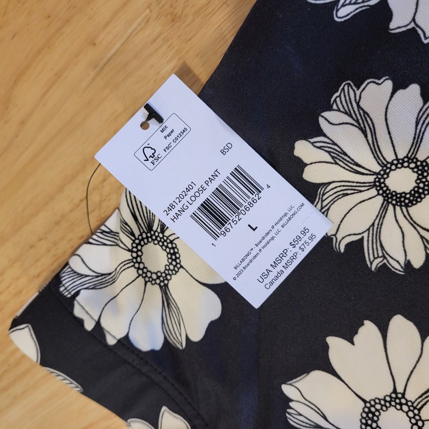 New with tag Billabong Daisy print black and white elastic waist bell bottom L