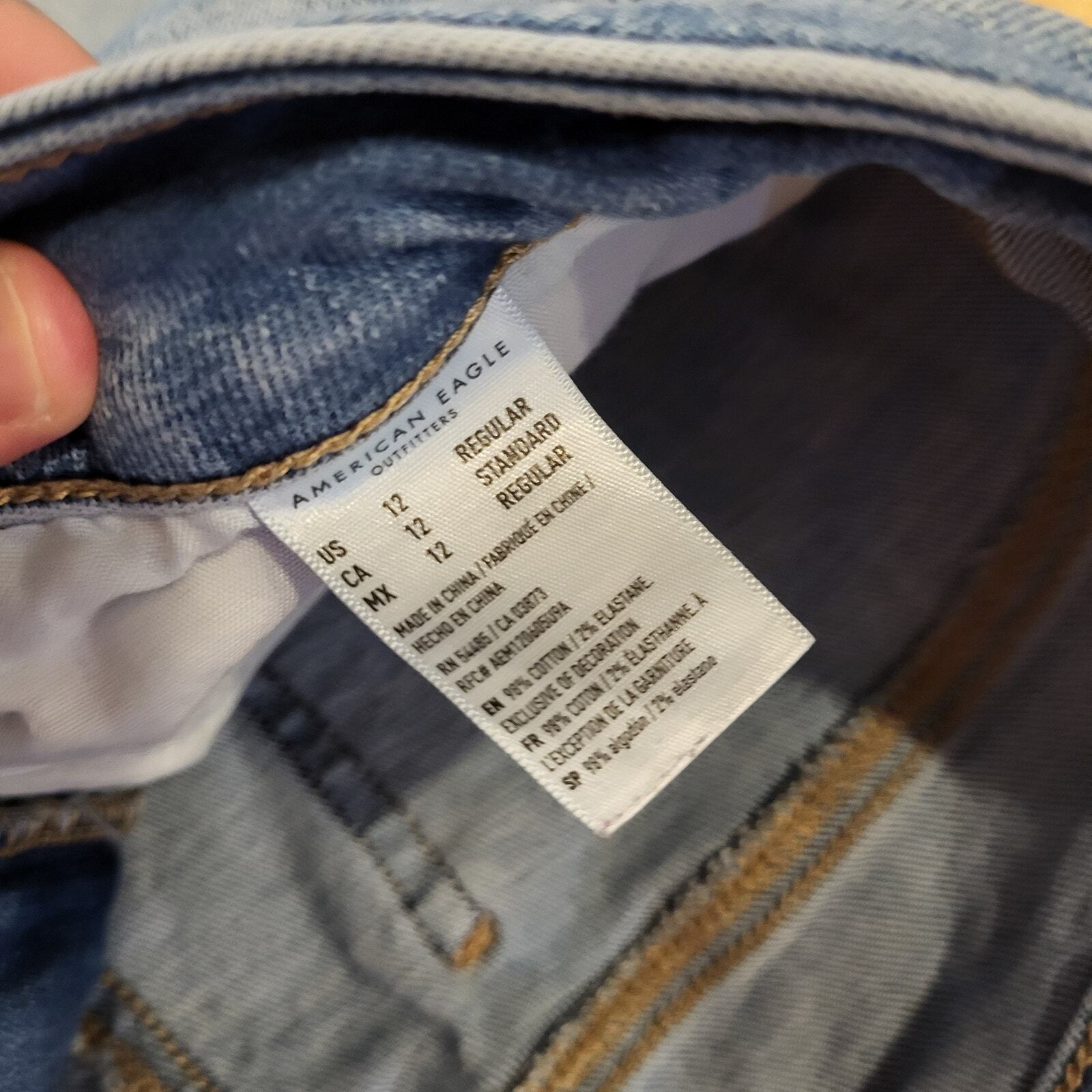 American Eagle Super Stretch Size 12 Straight Leg Distressed Medium Wash