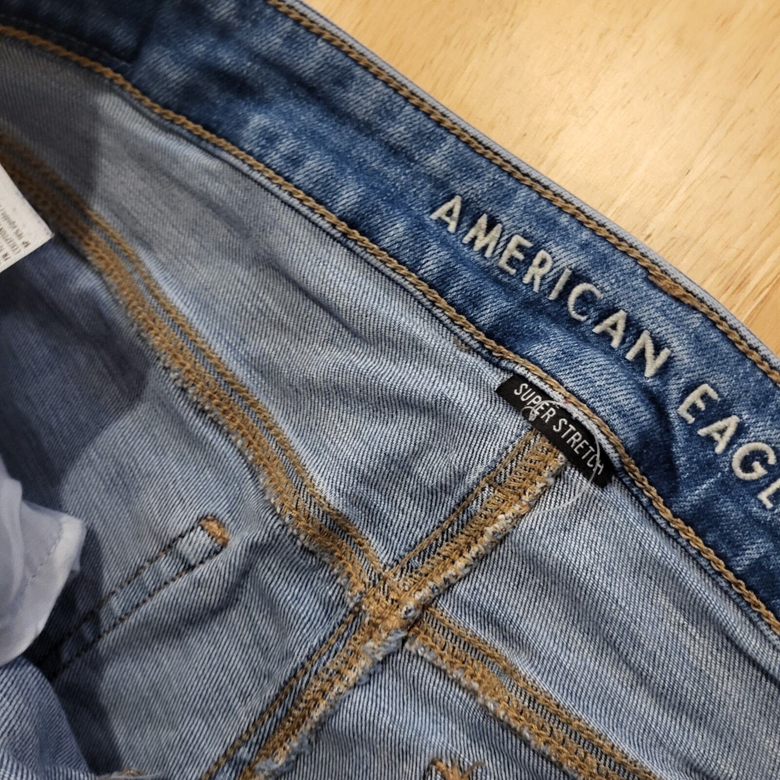 American Eagle Super Stretch Size 12 Straight Leg Distressed Medium Wash