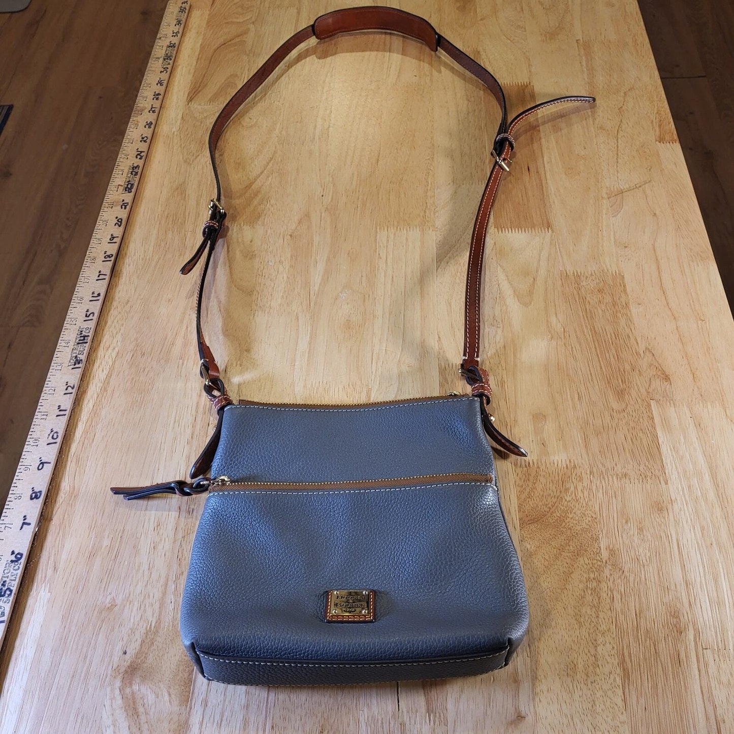 Dooney & Bourke Pebble Grain Letter Carrier Bag Dark Gray Red Lining Gold