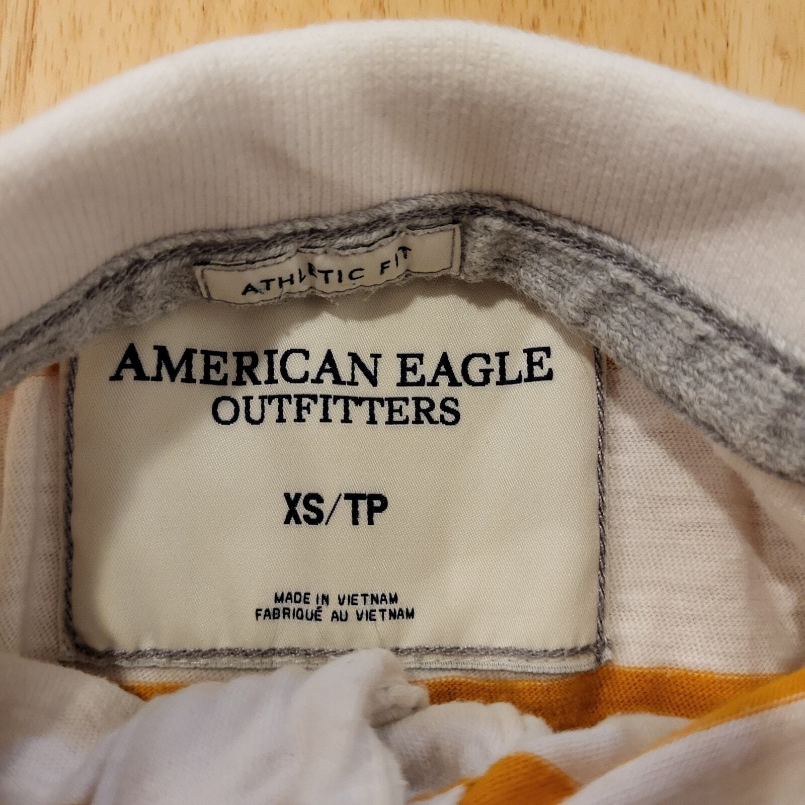 American Eagle Outfitters XS Polo Orange Striped White Collared Short Sleeve