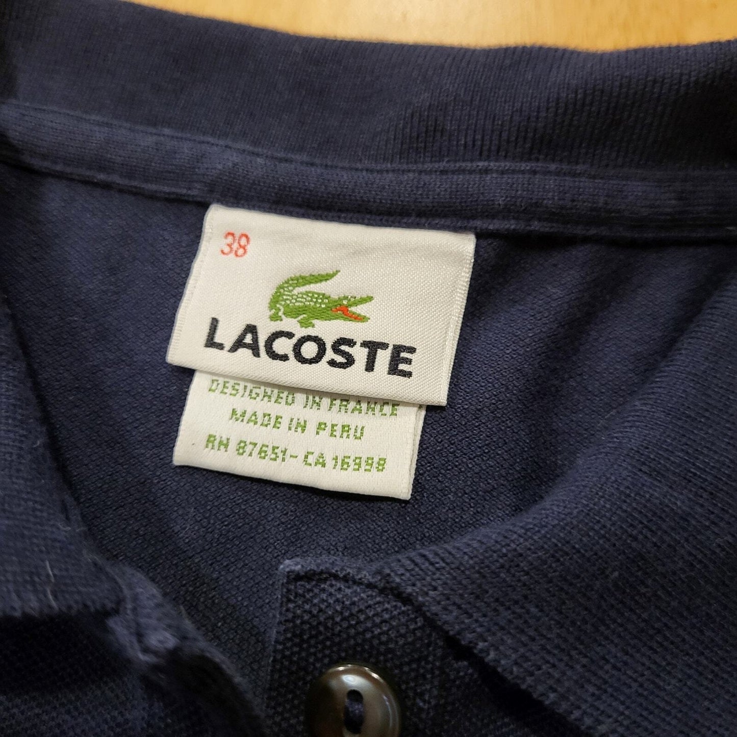 Navy Blue Lacoste Golf Polo Size 38 16" P2P (See Photo for Discoloration)
