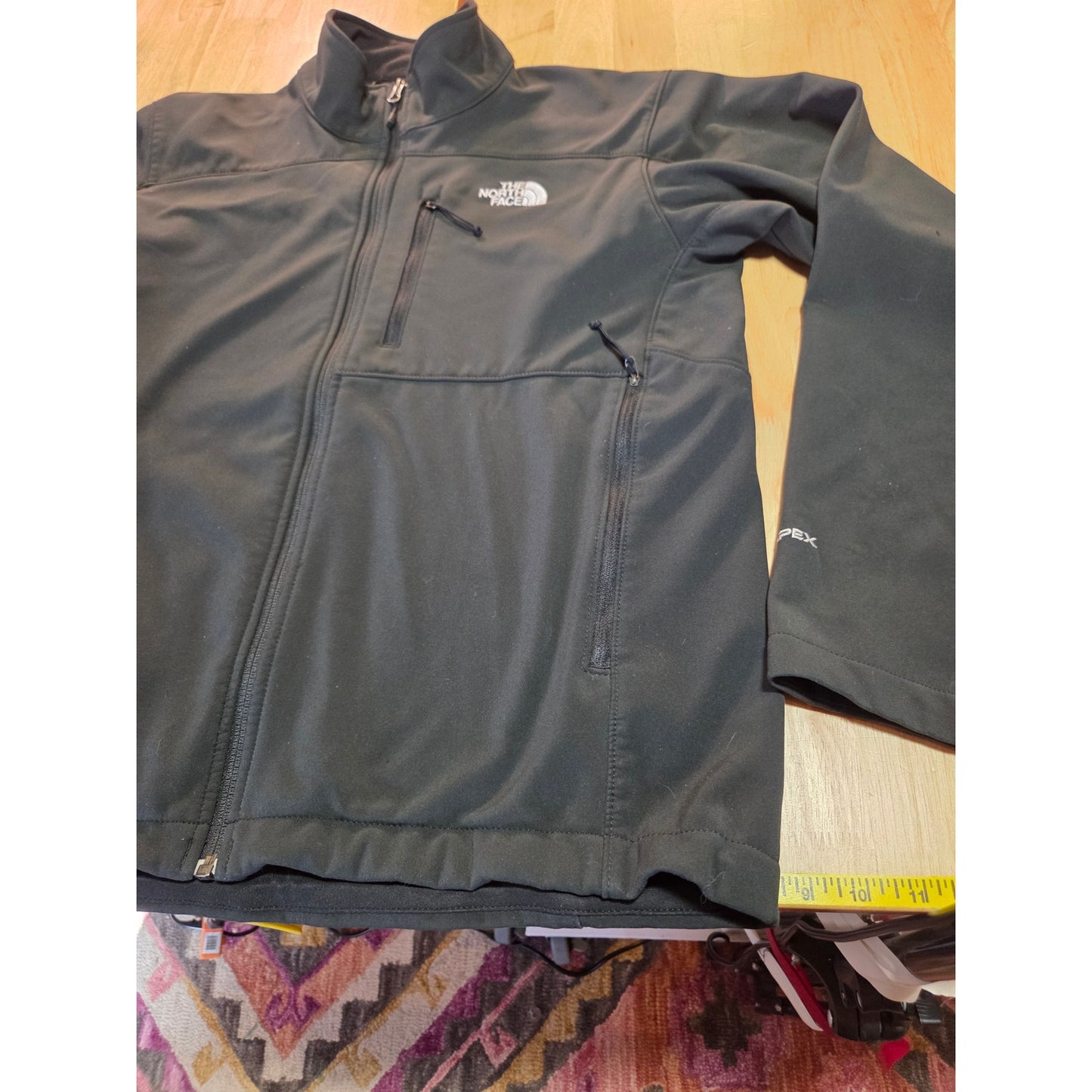 Black North Face jackets missing straps on sleeves but good condition LRG