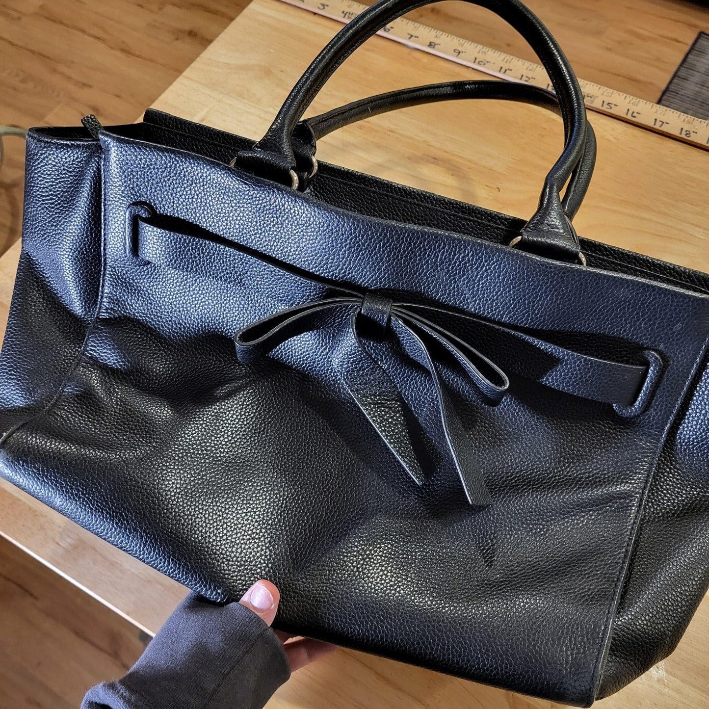 Kate Spade black pebbled leather top handle bag large bow zip closure