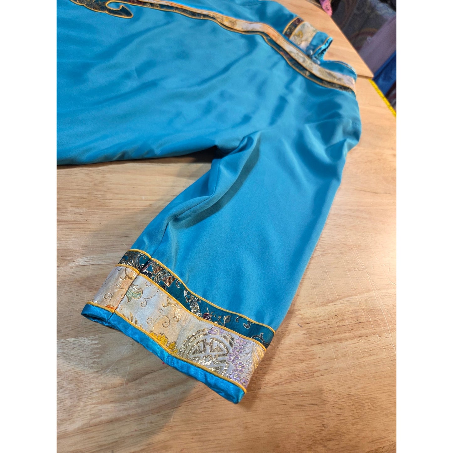 Turquoise blue Chinese traditional dress cap sleeve ornamental trim detail small