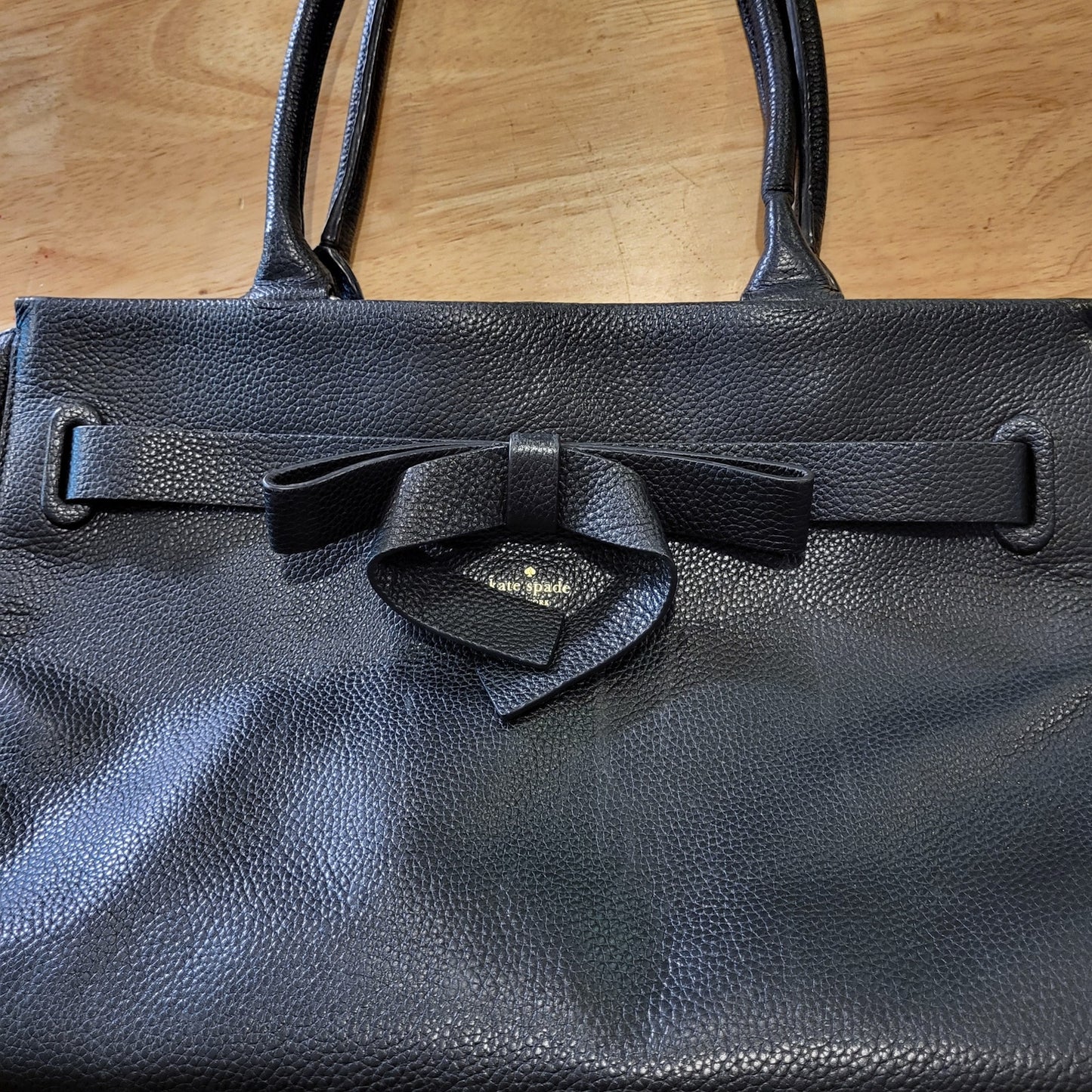 Kate Spade black pebbled leather top handle bag large bow zip closure