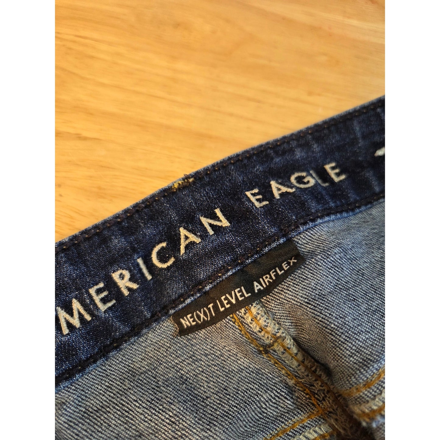 American Eagle 28x30 next level airflex skinny medium dark wash distressed jeans