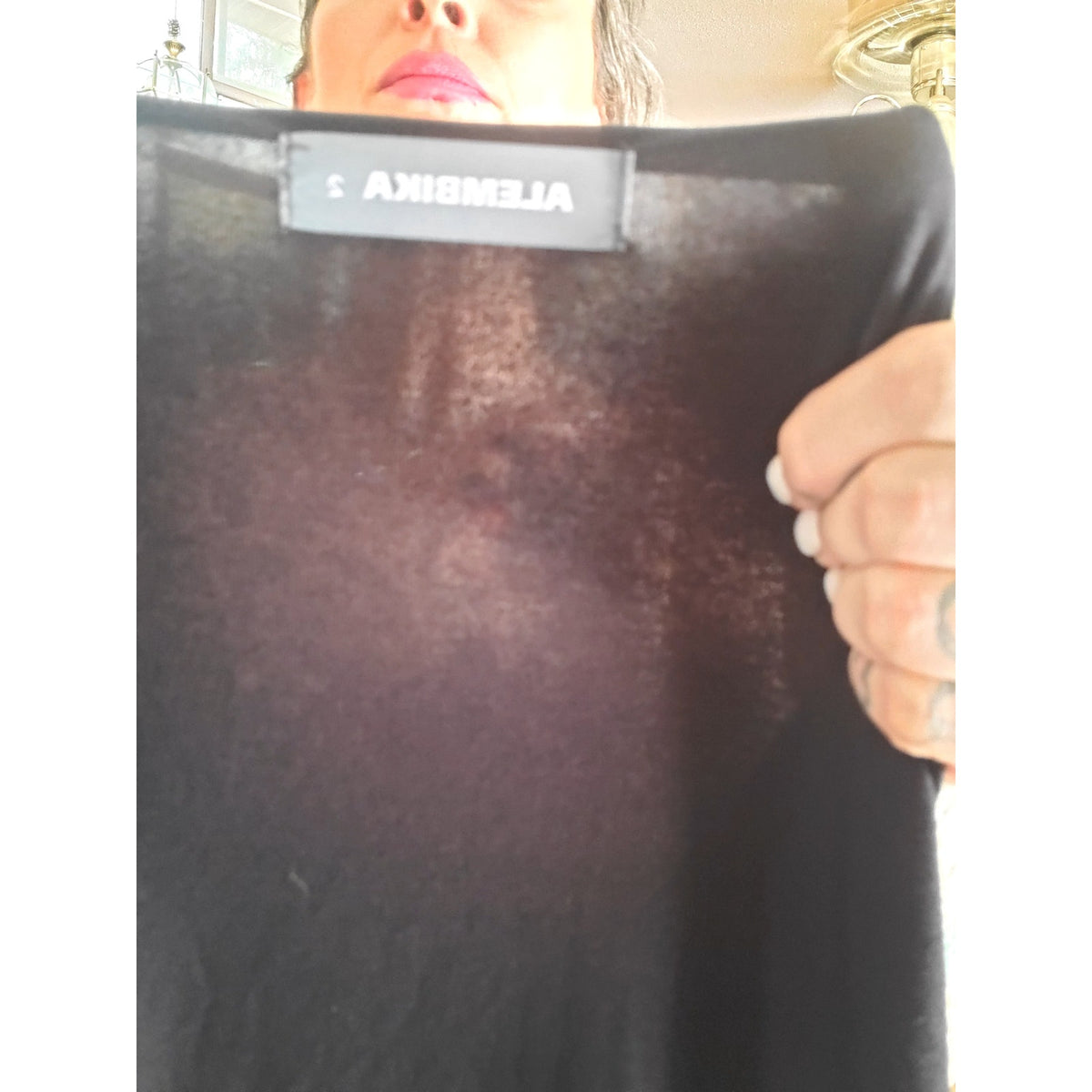 Alambika black tank dress asymmetrical hem jersey knit size 2