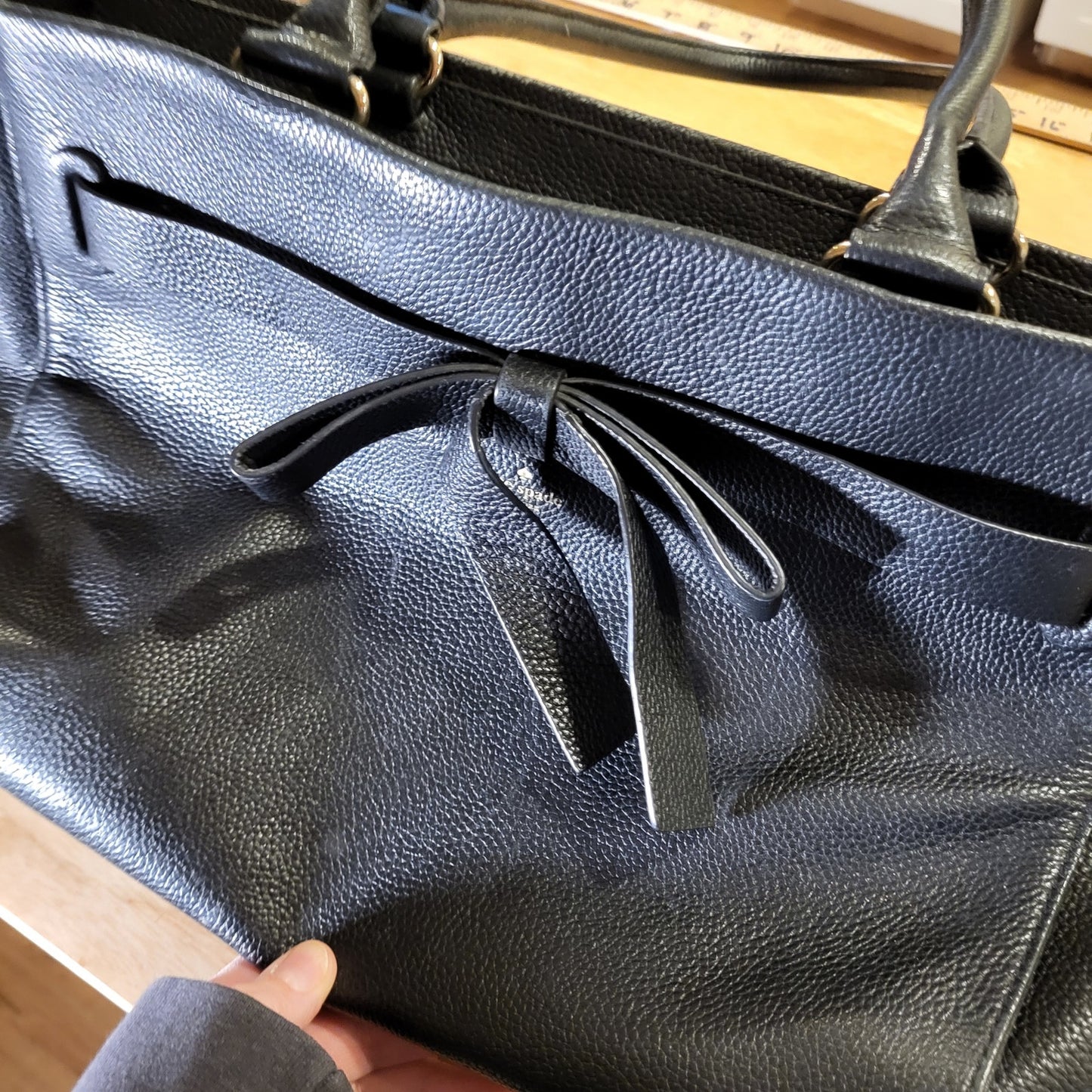 Kate Spade black pebbled leather top handle bag large bow zip closure