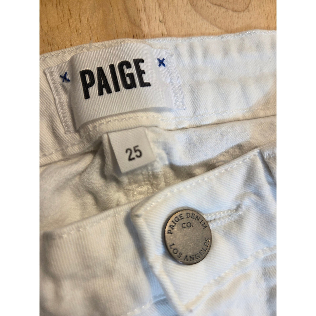 Paige white denim skinny jeans size 24