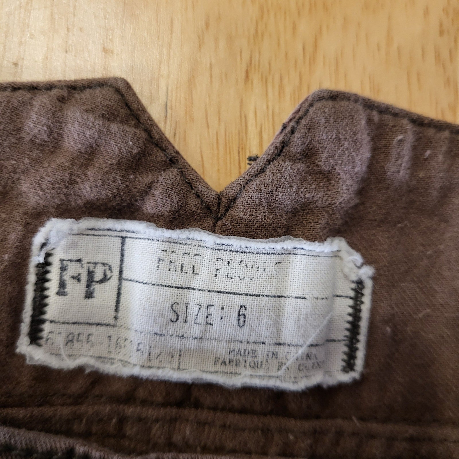 Free People Brown Tapered Slacks Pants Size 6 contrast cuff back waist detail