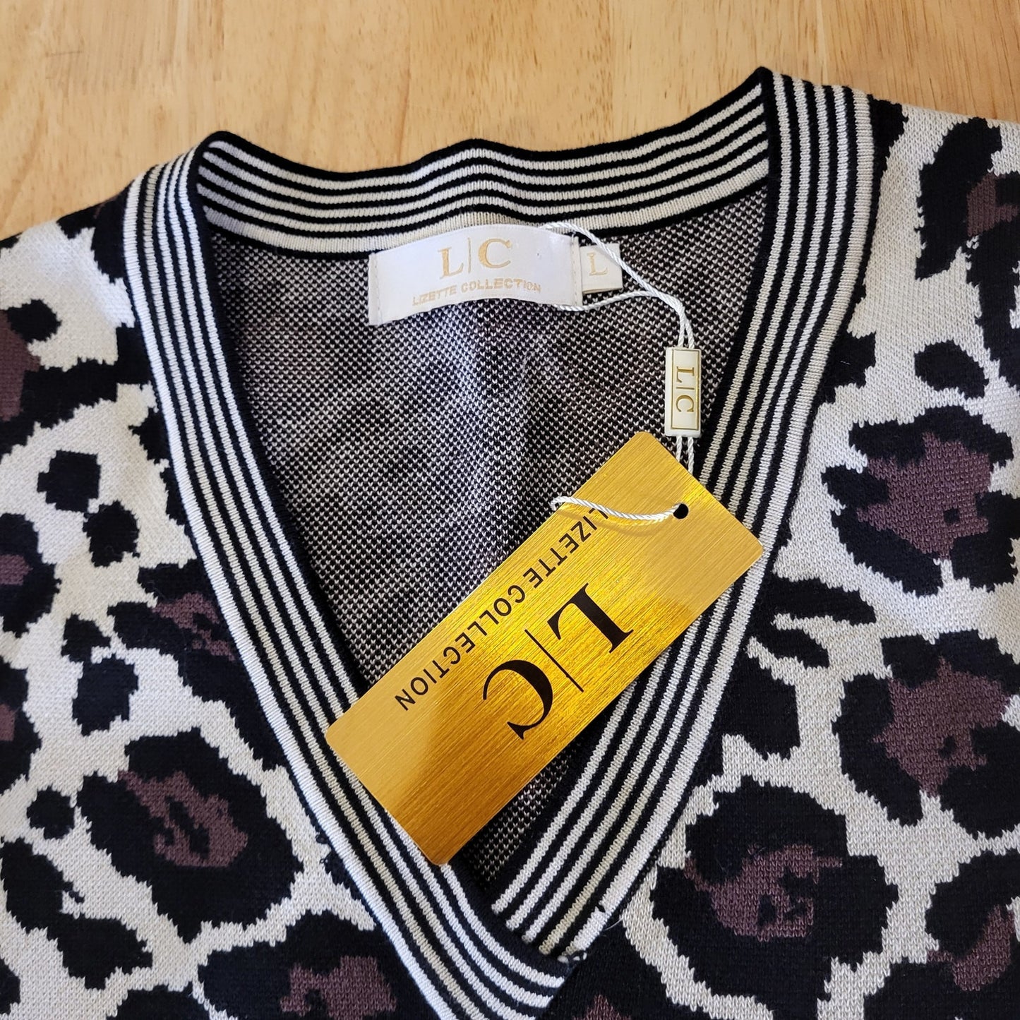 NWT Lauren Conrad Leopard Knit V-neck Sweater 15" p2p Large (fits tight) |